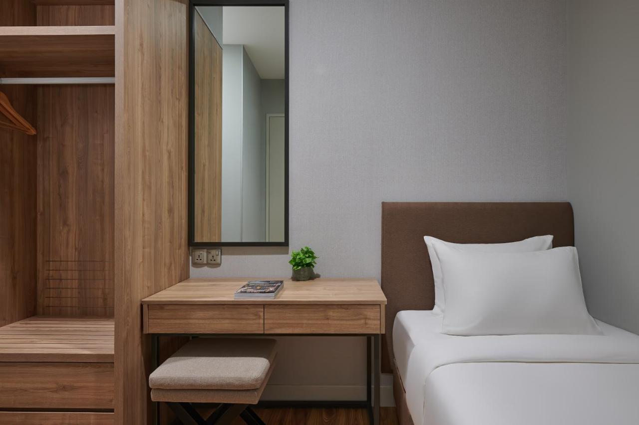 Mercure Living Путраджая Екстериор снимка A bedroom at the hotel