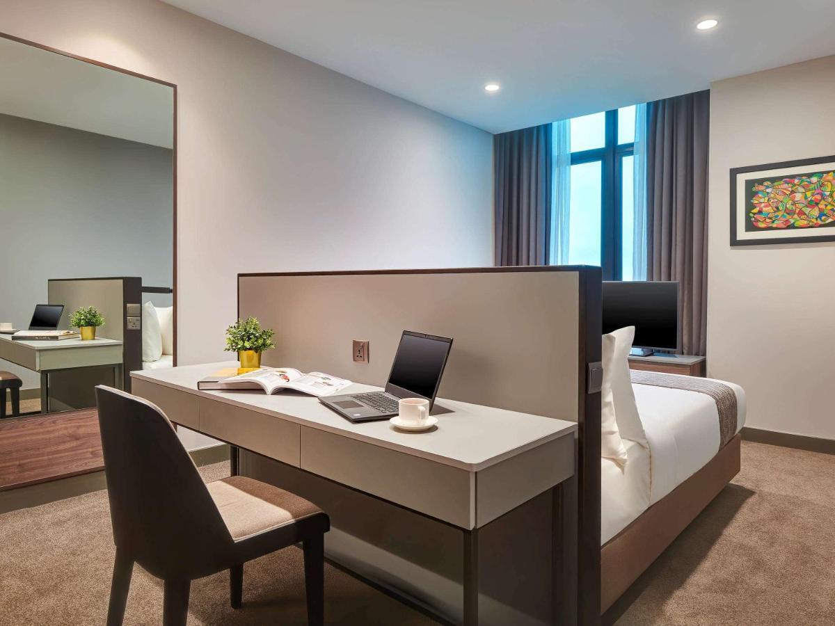 Mercure Living Путраджая Екстериор снимка A bedroom at the hotel